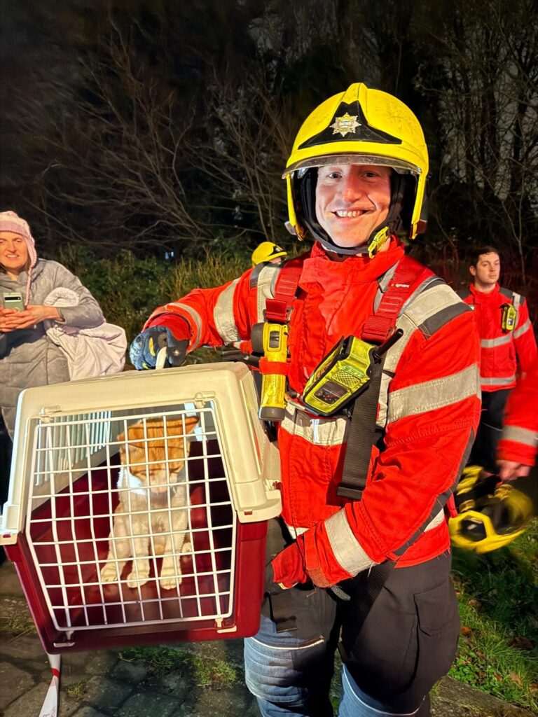 News for Peterborough and Cambridgeshire - Mission accomplished: Cottenham firefighters when they were asked to call in to Trumpington to assist in getting a 6 month old kitten out of a tall tree. PHOTO: Cottenham Community fire and rescue station