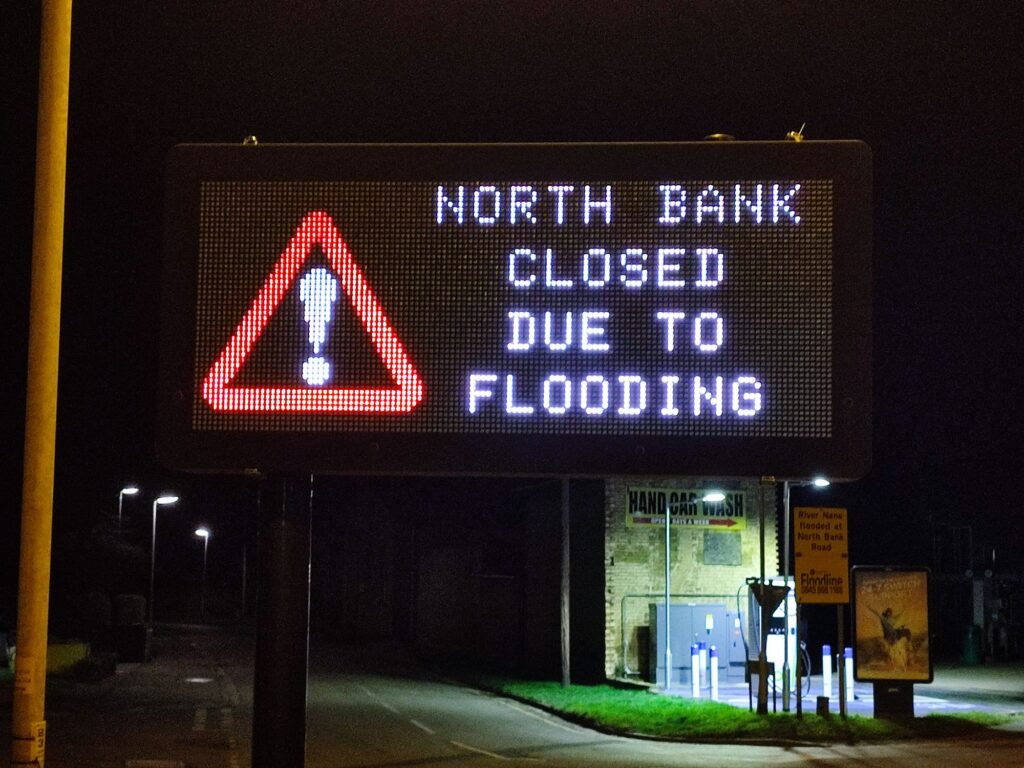 Fed up motorists are using local knowledge – some say commonsense – to continue to use the North Bank road near Whittlesey despite closure measures put in place because of flooding. 