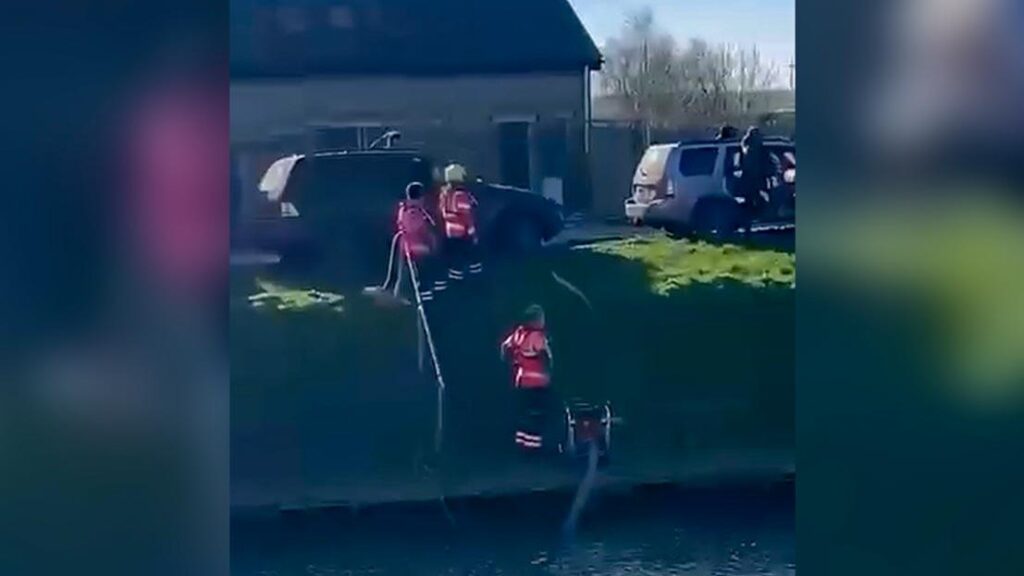 Grainy photos taken from a video made by an onlooker of the incident at Ramsey involving fire crews and travellers. The video is being edited by CambsNews for release later today. 