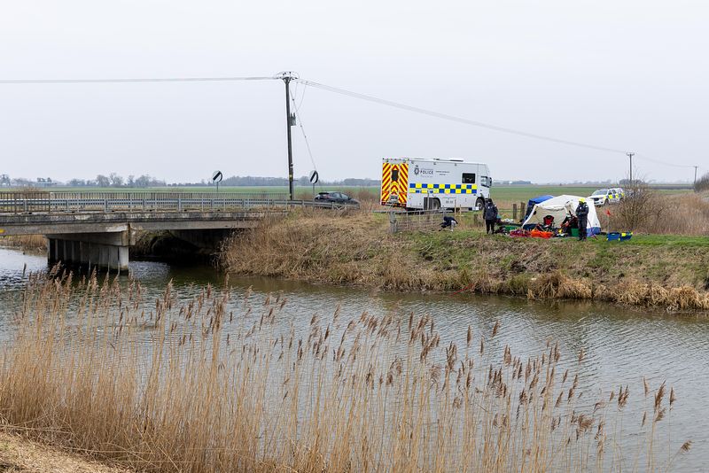 Cambridgeshire police searching for missing Julie Buckley of Christchurch near March have launched a murder investigation. Above: Divers from Nottinghamshire police search a river near her home today. PHOTO: Terry Harris for CambsNews