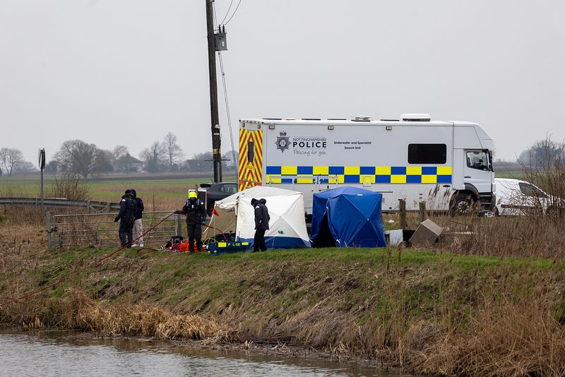 Cambridgeshire police searching for missing Julie Buckley of Christchurch near March have launched a murder investigation. Above: Divers from Nottinghamshire police search a river near her home today. PHOTO: Terry Harris for CambsNews