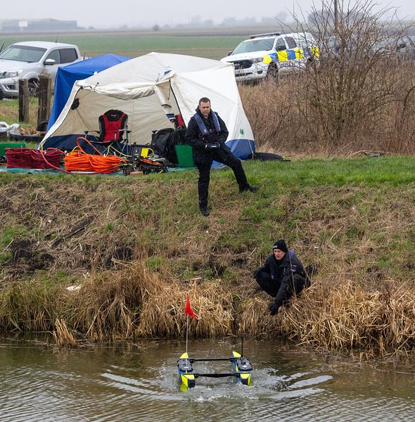 Cambridgeshire police searching for missing Julie Buckley of Christchurch near March have launched a murder investigation. Above: Divers from Nottinghamshire police search a river near her home today. PHOTO: Terry Harris for CambsNews