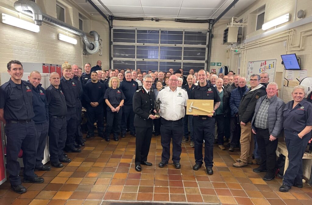 Russell Gooderham’s career was celebrated at a retirement party held at the station, where he was presented with a firefighter figurine by Chief Fire Officer Matthew Warren, as well as a mounted silver axe by the crew. 