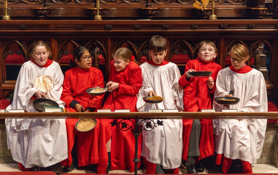 Choristers from Ely Cathedral putting in some practice for this year’s pancake race which was held on Shrove Tuesday (March 4) IMAGE: BavMedia