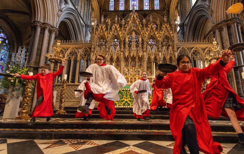 Choristers from Ely Cathedral putting in some practice for this year’s pancake race which was held on Shrove Tuesday (March 4) IMAGE: BavMedia