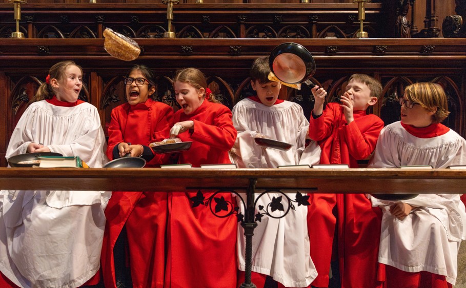 Choristers from Ely Cathedral putting in some practice for this year’s pancake race which was held on Shrove Tuesday (March 4) IMAGE: BavMedia